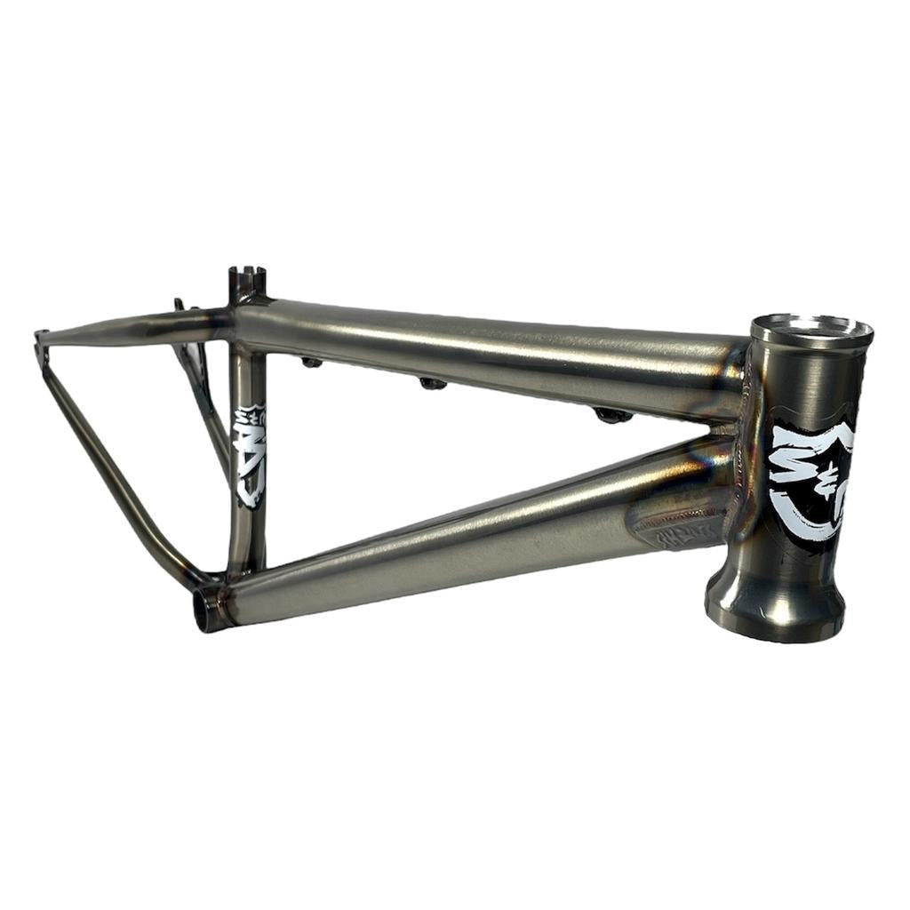 The S&M Big Jumper 26 Inch Dirt Jumper Frame features a matte metallic BMX frame with welded joints, suspension fork compatibility, and white logo decals on the head tube and seat tube, shown on a white background.