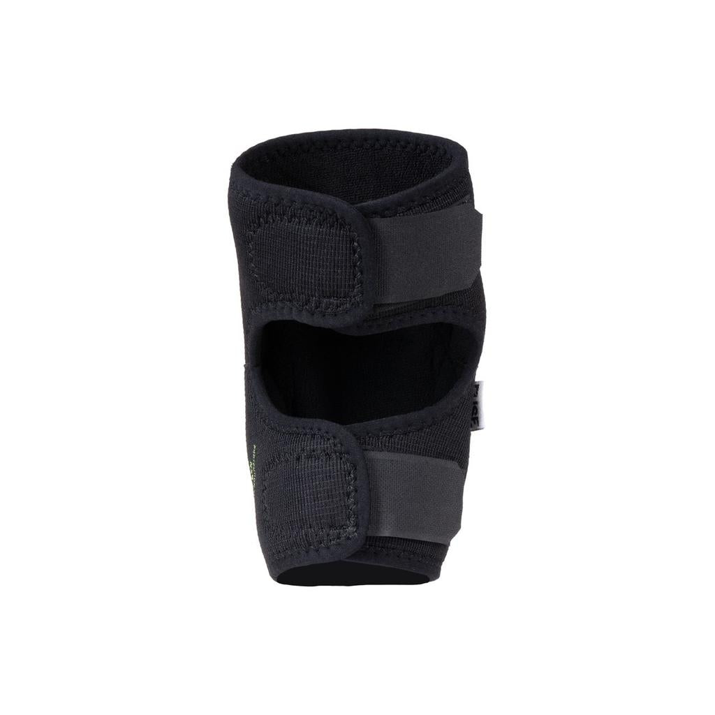 A pair of Fuse NXG Kids Knee Pads in black neoprene, featuring adjustable hook-and-loop straps and an open patella design, is displayed upright on a plain white background.