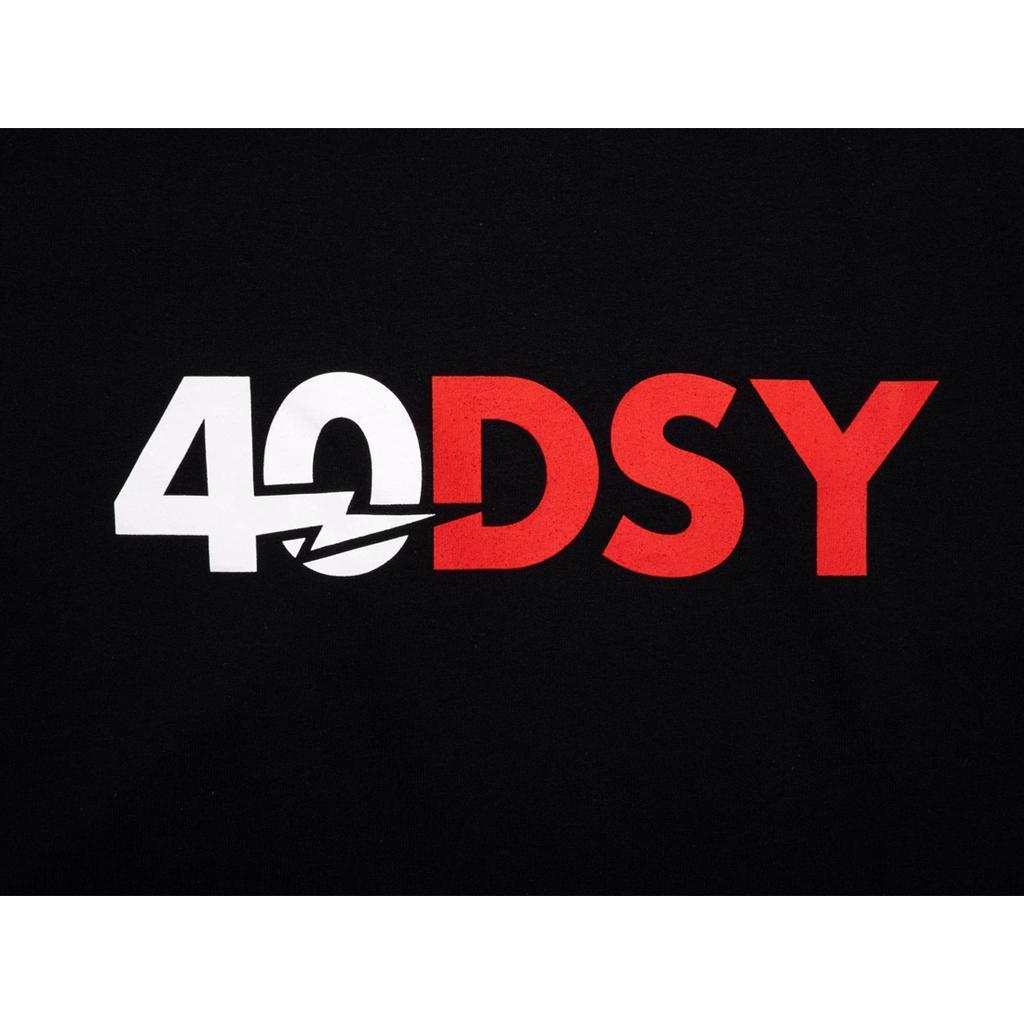 The Odyssey 40 Year T-Shirt features bold white "40" and red "DSY" on black, with a lightning bolt piercing the zero and linking to the "D," adding an electrifying Odyssey feel.