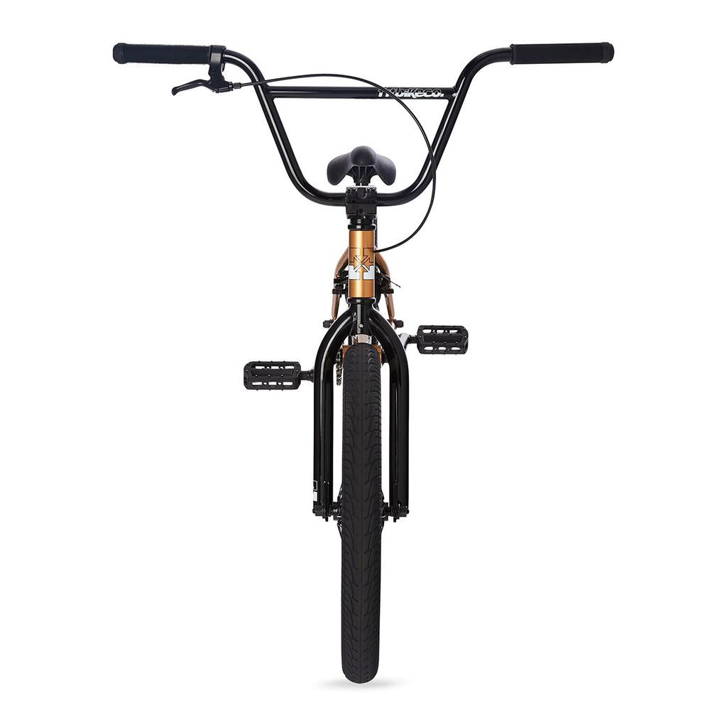 Front view of the Fit Series One 20 Inch Bike (2023), featuring black handlebars, black pedals, a brown frame, and a single front tire against a white background.