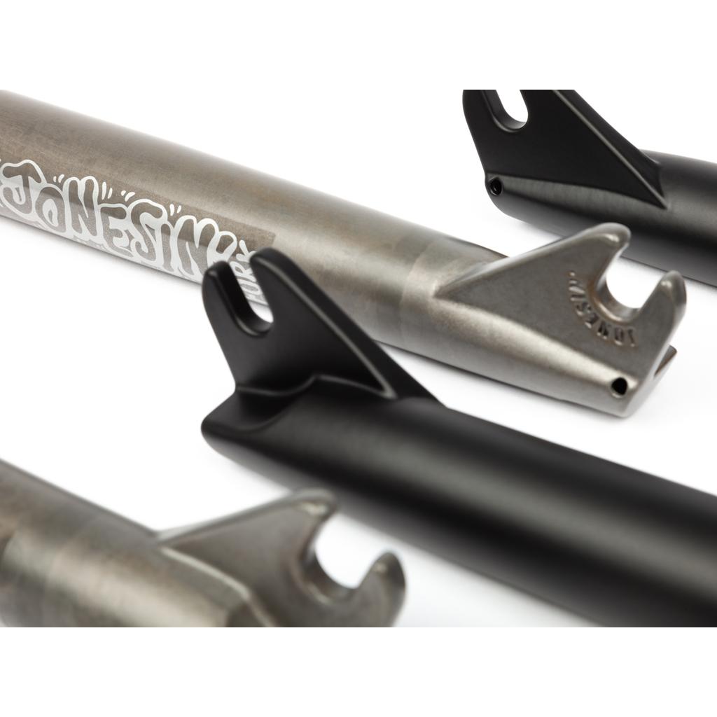 Close-up of BSD Jonesin Fork dropouts in raw metal and matte black finishes, featuring "Jones" branding on one fork leg. The 22mm offset on the BSD Jonesin Fork provides precise handling for your BMX ride.