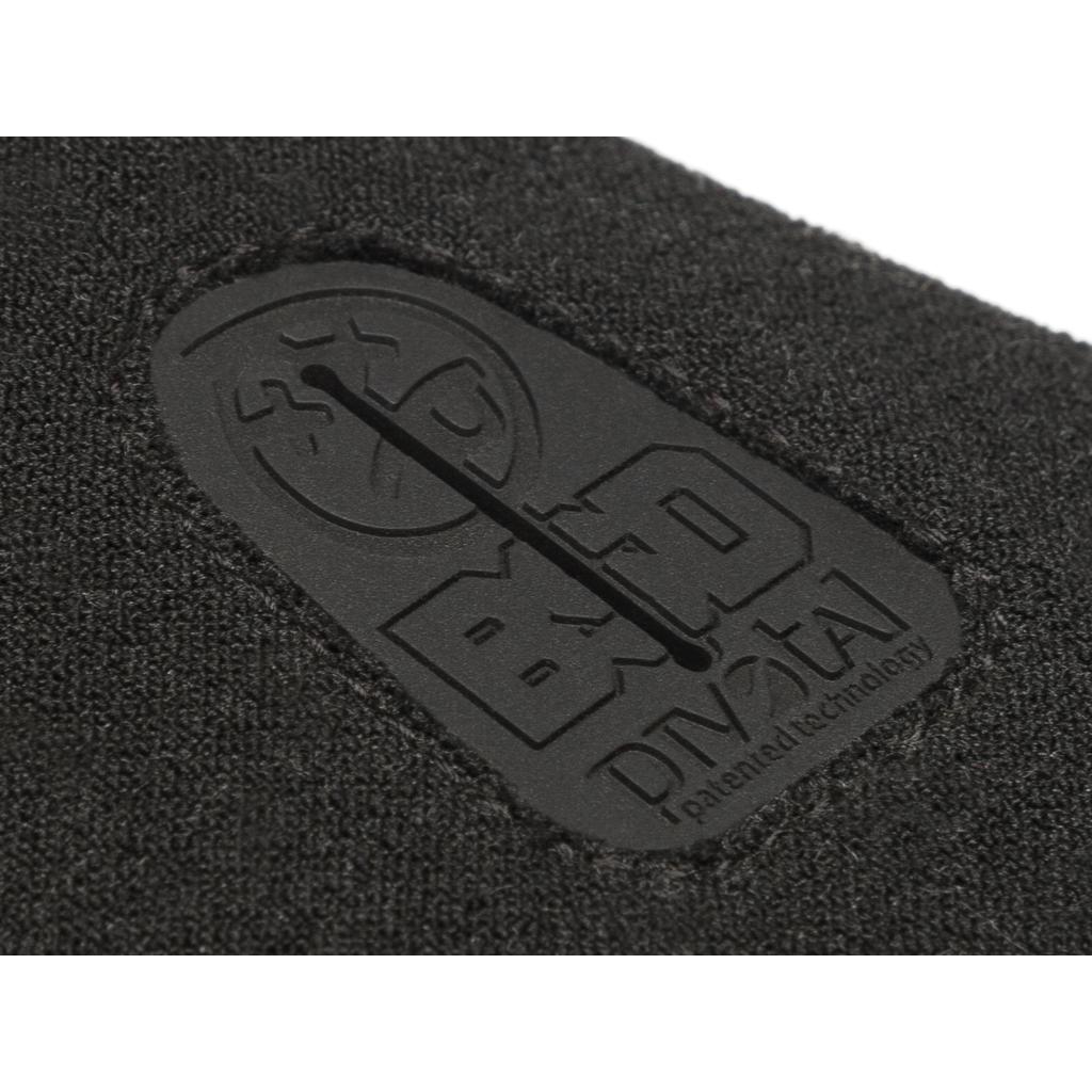 Close-up of a black rubber label with "BYD", "DIVOTAL", and "patented technology" embossed, featured on the BSD Alvx Eject Pivotal Seat—an Alex Donnachie signature BMX seat.