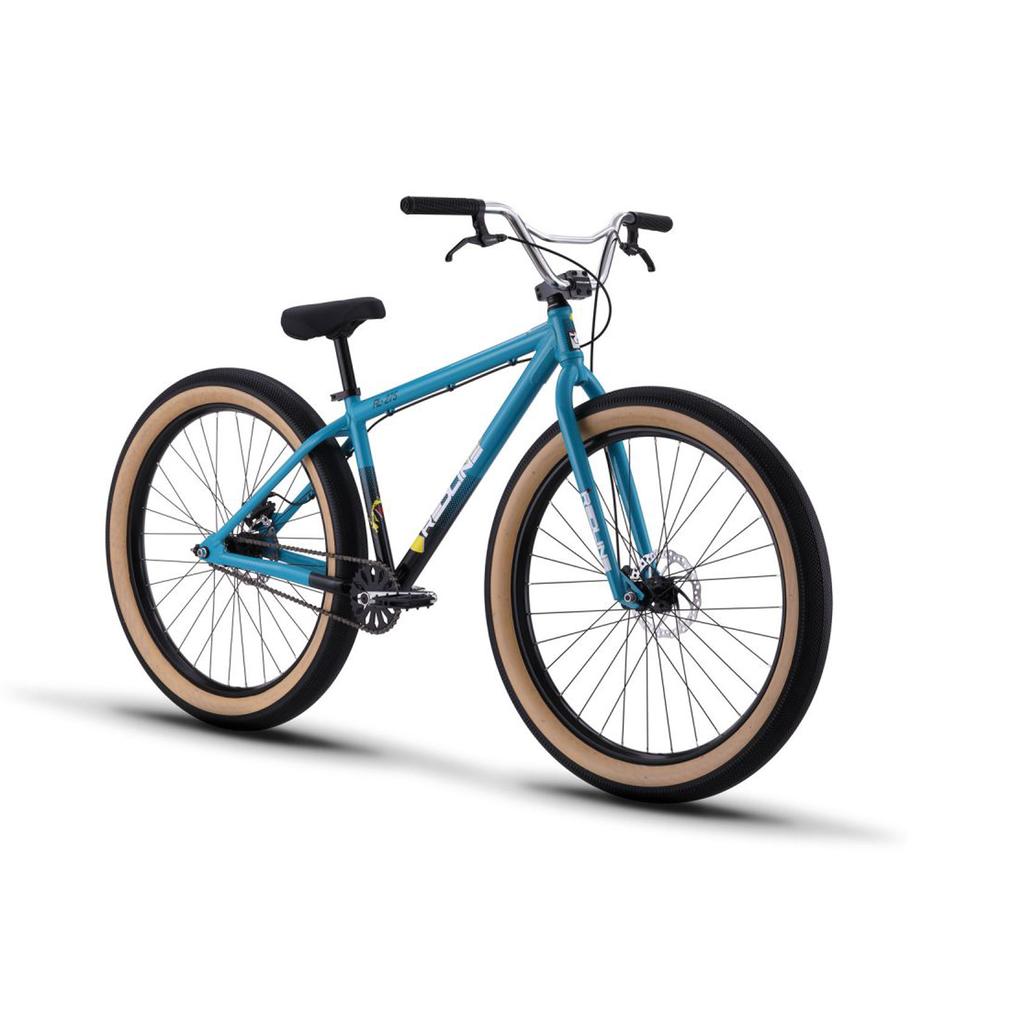 The Redline RL 275 27.5 Inch Bike, a blue retro BMX cruiser with large tan-rimmed fat tires, a black seat, and wide handlebars for adults, is displayed on a white background.