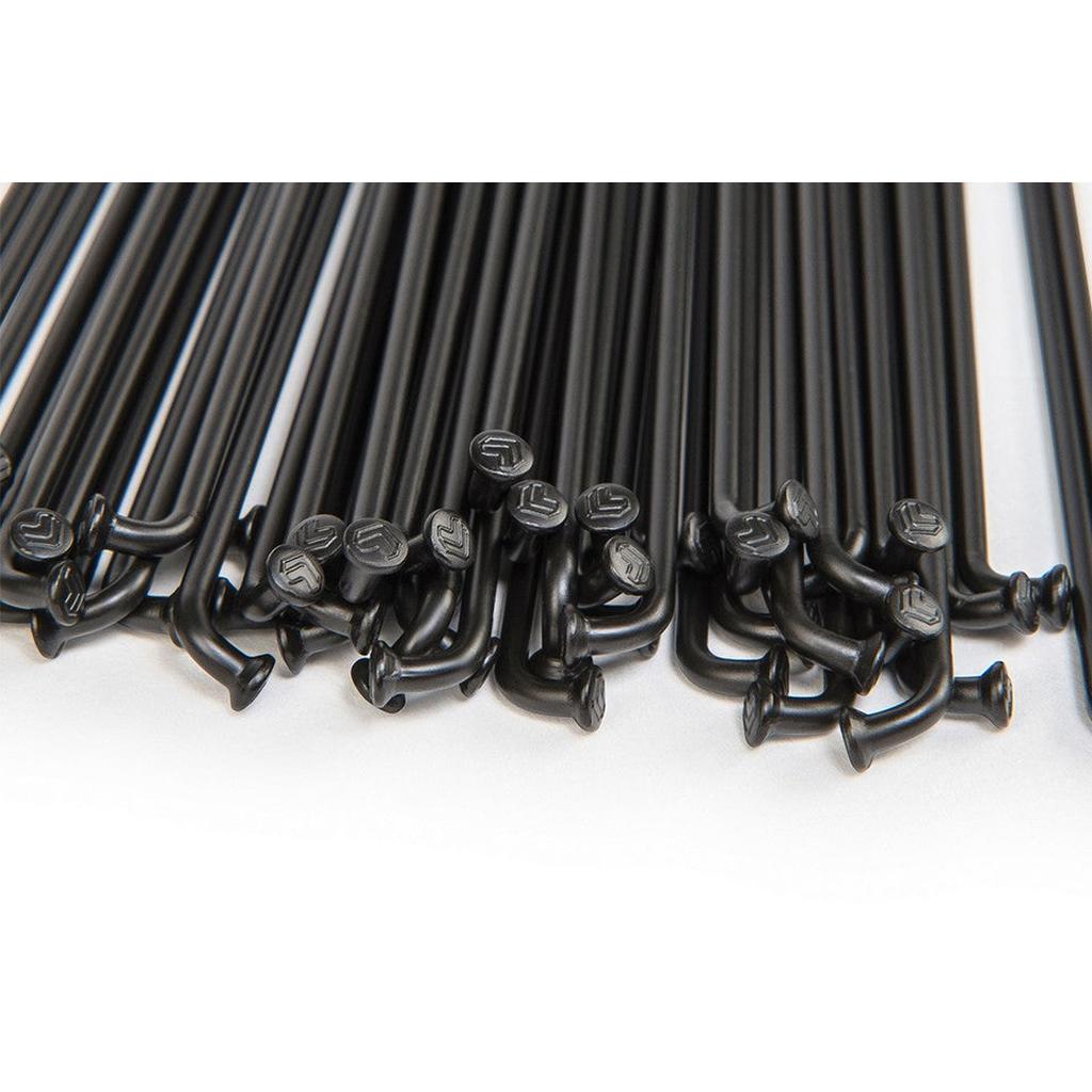 A pack of Eclat Stainless Spokes (40 pack), featuring black spokes with hooked ends and embossed heads, is arranged on a white surface.