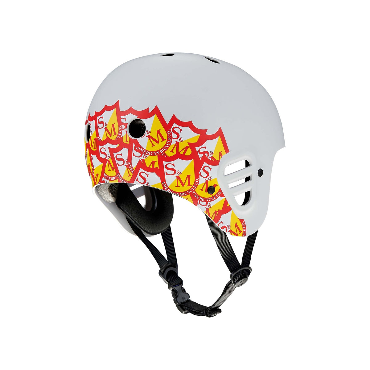 Protec Full Cut Helmet / S&M Signature Light Grey featuring red and yellow shield-shaped S&M logos on the sides, black straps, and ventilation holes on the top and sides—engineered for high-impact protection in action sports.
