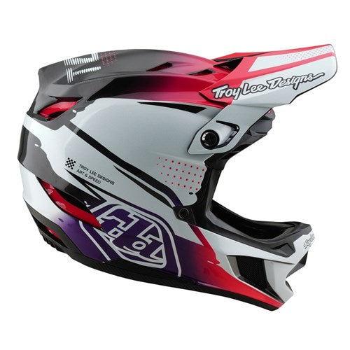 A TLD 25.1 D4 Carbon Helmet (MIPS) in Drip White featuring a striking geometric pattern with Troy Lee Designs logo, perfect for downhill BMX adventures.