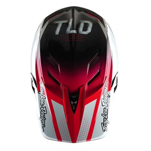 Front view of the TLD 25.1 D4 Carbon Helmet (MIPS) in Drip White, featuring a red, black, and white design with the "Troy Lee Designs" logo on the side. Ideal for BMX enthusiasts who prioritize style and superior protection with a full-face helmet.