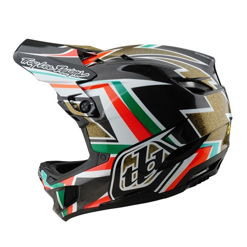 The TLD 25.1 D4 Carbon Helmet (MIPS) features a black full-face design with green, red, and white geometric patterns and the Troy Lee Designs logo. This helmet offers style and safety for downhill BMX enthusiasts.