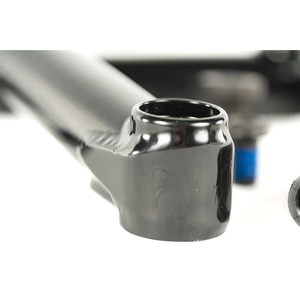 Close-up of a black metal bike frame part with a glossy finish and cylindrical opening, designed for use with Cult Crew Cranks, which have strong chromoly arms and a 19mm spindle.