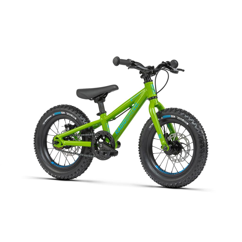 The Radio Zuma 14 Inch Bike is a lightweight kids’ mountain bike, featuring a green frame with black handlebars, seat, and tires, sturdy construction, and thick treaded wheels—ideal for young riders.