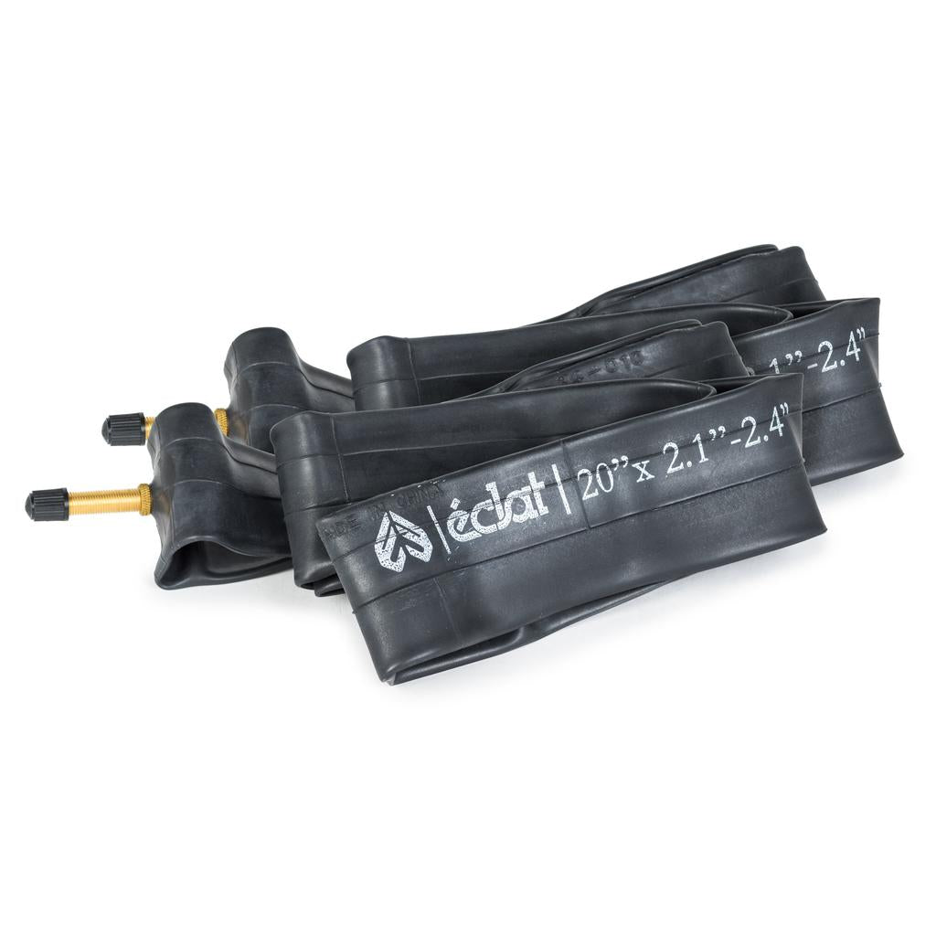 Two coiled black 20-inch Eclat AMP Inner Tubes (Pair) with Presta valves and white printed sizing/brand logos are shown on a white background, featuring a puncture-resistant design.