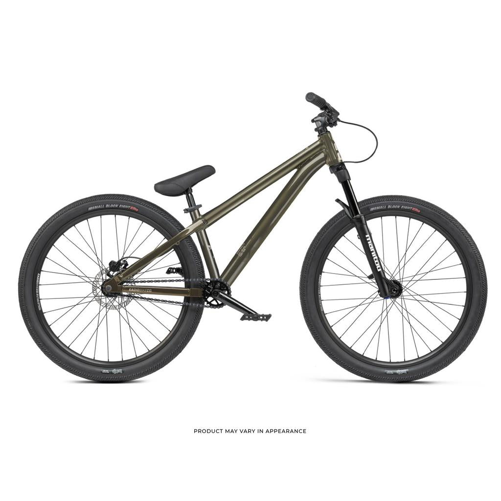 The Radio Griffin 24 Inch Dirt Jumper Bike, shown in profile on a white background, features a matte olive green frame with a sloped top tube, front suspension fork, single-gear drivetrain, and black wheels with knobby tires—ideal for pumptrack riding.