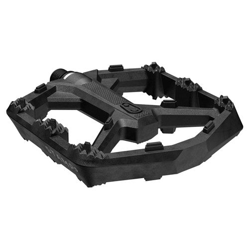 The Crank Brothers Stamp 0 Pedals (Large) feature a black composite body with a wide, concave platform and raised grip pins for traction, shown from the side against a white background.