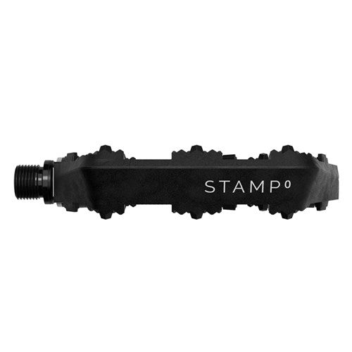 Side view of a black Crank Brothers Stamp 0 Pedal (Large) with "STAMP" and "0" printed on its concave platform surface.