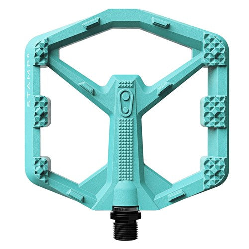 The Crank Brothers Stamp 0 Pedals (Small) feature a turquoise flat design with a wide composite body, textured surface for maximum grip, and a central threaded axle for secure attachment.