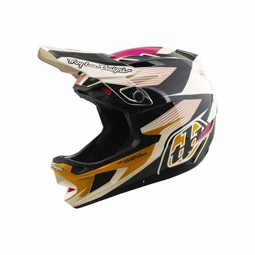 The TLD D4 Polyacrylite Helmet in the Turbo Acid/Fuchsia colorway is a full-face helmet built for motocross and mountain biking, featuring a visor and bold black, white, pink, and gold geometric patterns with the number 55 on the side. Designed with advanced Mips brain protection technology, this helmet provides enhanced safety on every ride.