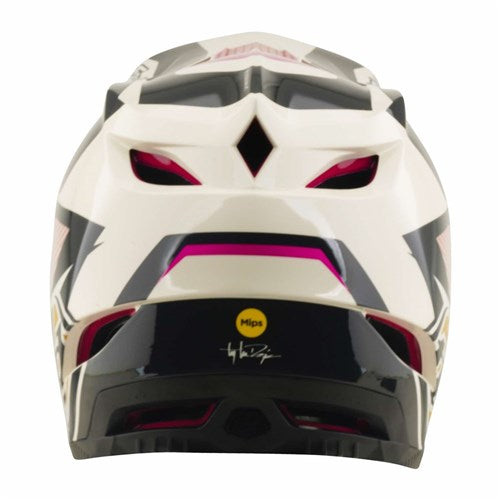 The TLD D4 Polyacrylite Helmet in Turbo Acid/Fuchsia is displayed from the back, showcasing its white and black color scheme with pink accents, multiple air vents for ventilation, the MIPS brain protection logo, and a distinctive signature graphic at the lower center—perfect for mountain biking enthusiasts who prioritize both style and safety.