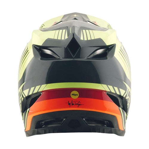 Back view of the TLD 25.2 D4 POLY HELMET MIPS QUALIFER in black and yellow with red and orange accents, featuring Mips protection and a signature near the bottom.
