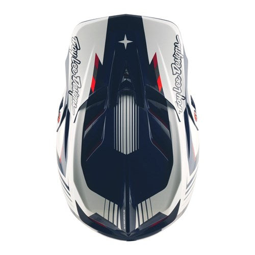 The TLD 25.2 D4 POLY HELMET MIPS QUALIFER BLUE / WHITE is a full-face motocross helmet with white, navy blue, and red geometric graphics, "Troy Lee Designs" on both sides, and Mips technology for extra safety.