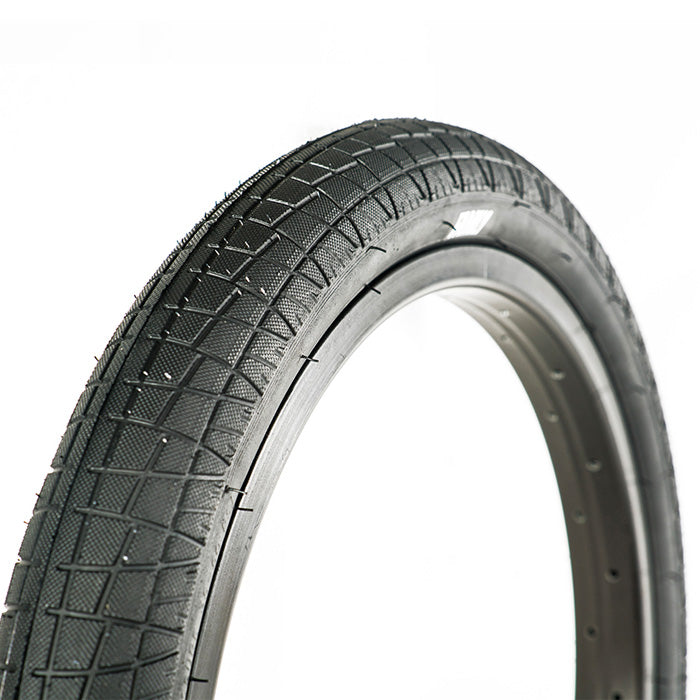 An 18 inch black Family BMX F2128 Tyre on a white background.