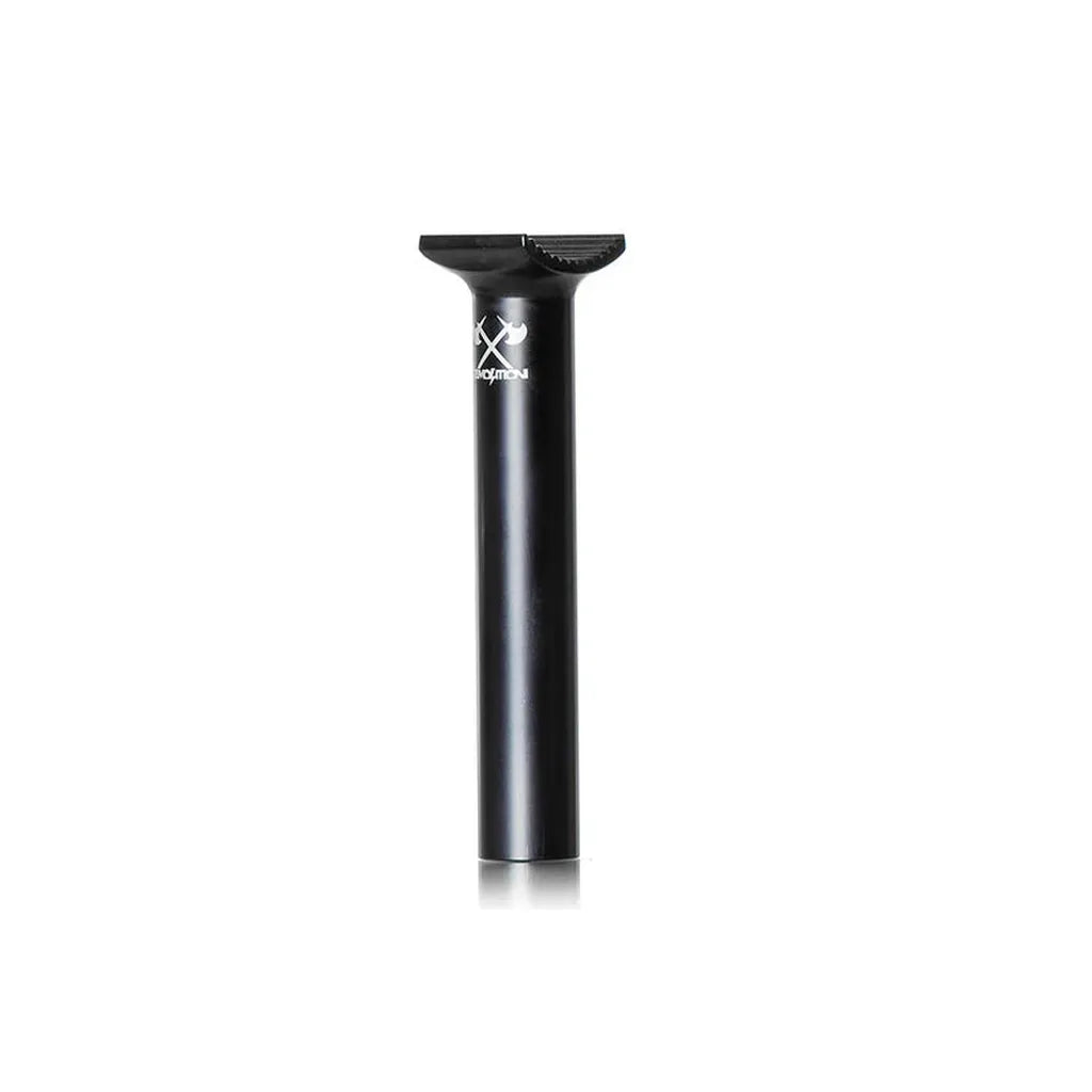 The Demolition Axes Pivotal Seat Post, a low-profile black seat post with a minimalist design made from forged alloy, is shown upright on a white background.