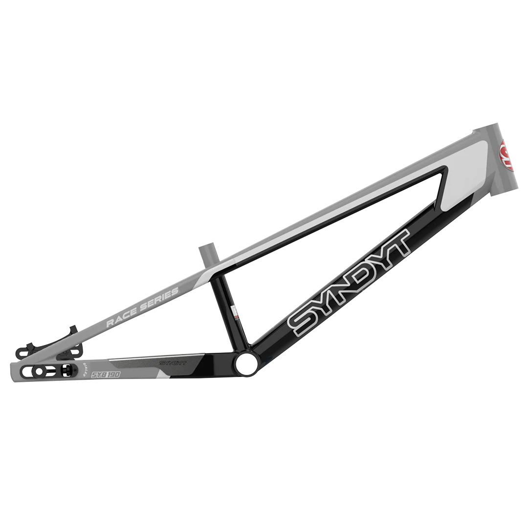The Syndyt 190 Junior XL Frame, a black, white, and gray 6061 alloy BMX frame labeled "SYNDYT RACE SERIES," is shown isolated on a white background, emphasizing its premium build for BMX racing.
