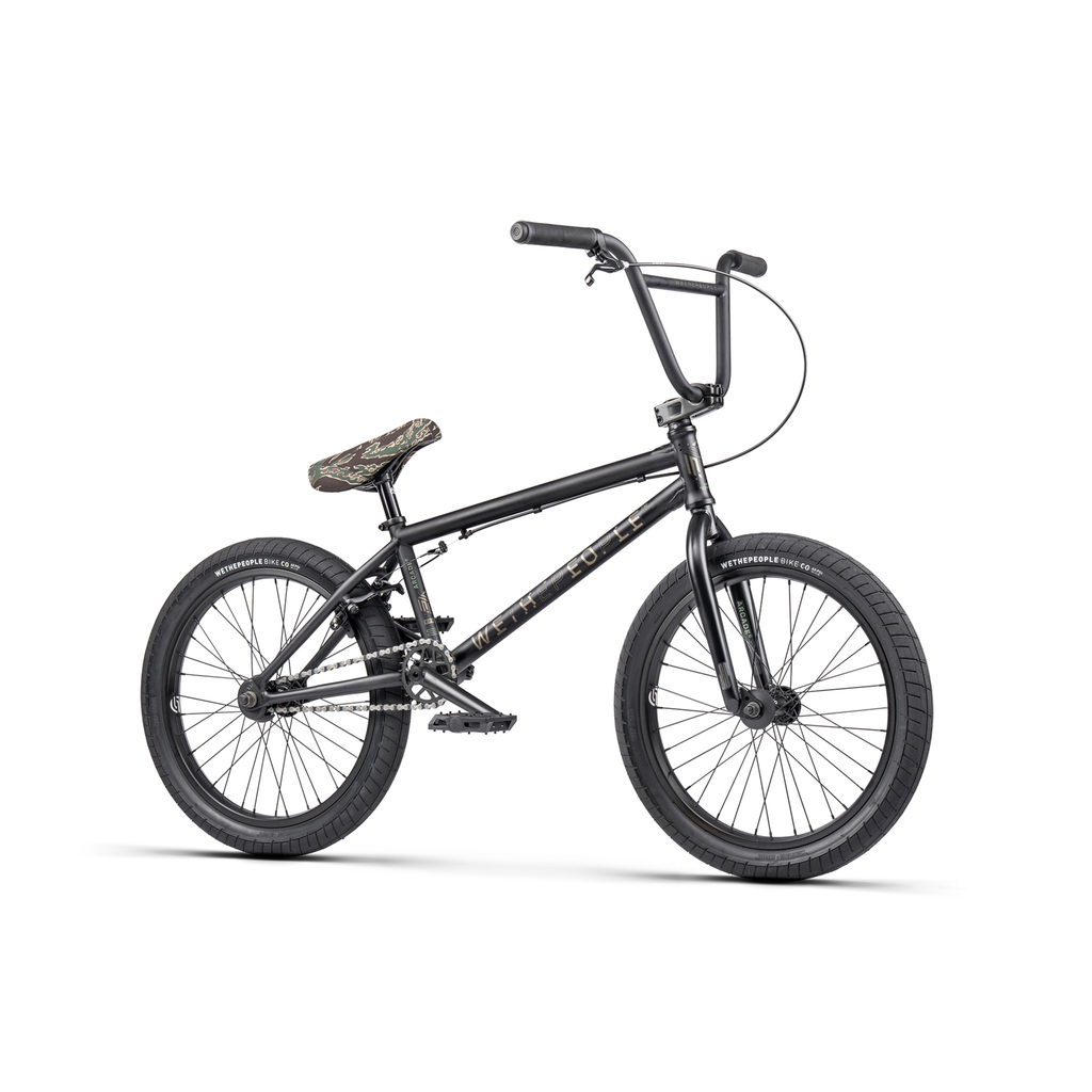 A black Wethepeople Arcade 20 Inch BMX bike with glossy frame and camouflage-patterned seat, standing upright against a white background.