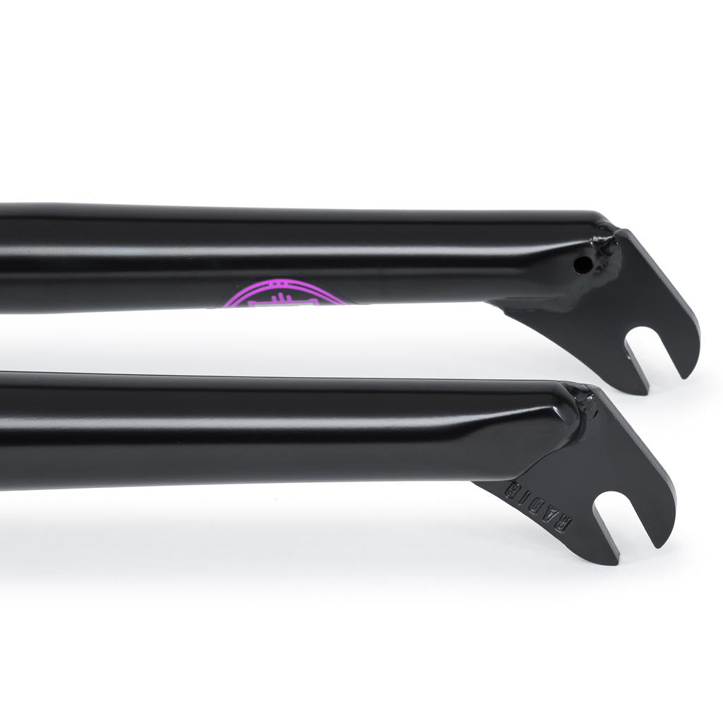 Close-up of two black metal Radio Nemesis Fork dropouts, one stamped with "FATIO," from a heat treated chromo fork, set against a white background.