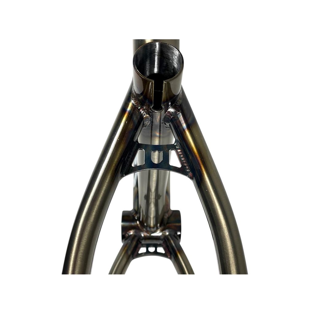 Close-up of the S&M Big Jumper 26 Inch Dirt Jumper Frame, highlighting its metallic welded joints and seat tube with disc brake mount, set against a white background.