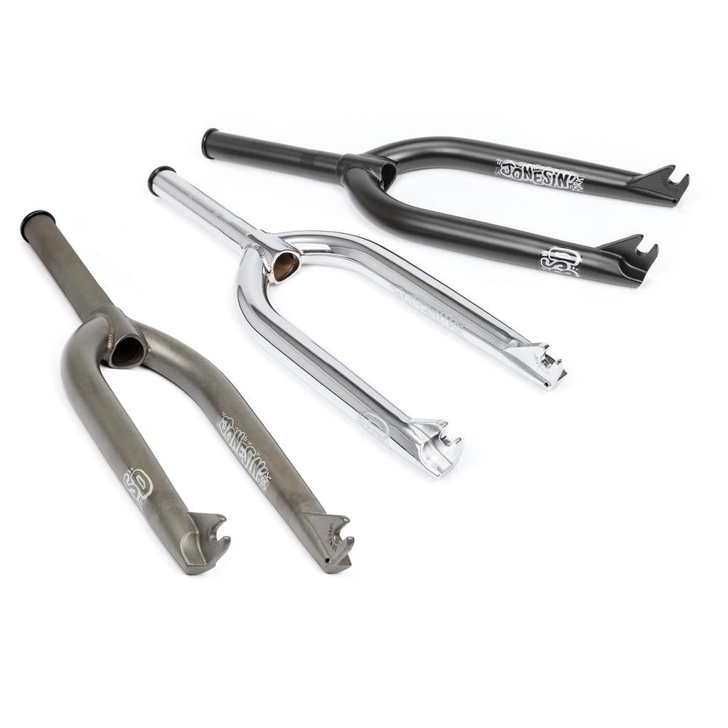 Three BSD Jonesin Forks, each with a 22mm offset, are shown side by side in matte grey, polished chrome, and black finishes on a white background.