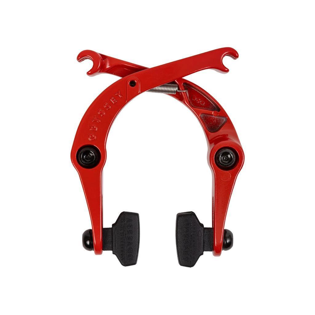 Odyssey Springfield Brakes U-brake, red, with two black brake pads, spring mechanism, and mounting bolts—an affordable solution for BMX bikes—shown from the front on a white background.