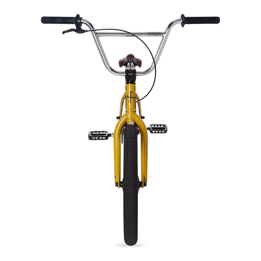 Front view of a yellow Fit TRL Bike (2023) BMX with trail geometry, black handlebars and pedals, plus a brown seat—all displayed against a plain white background.