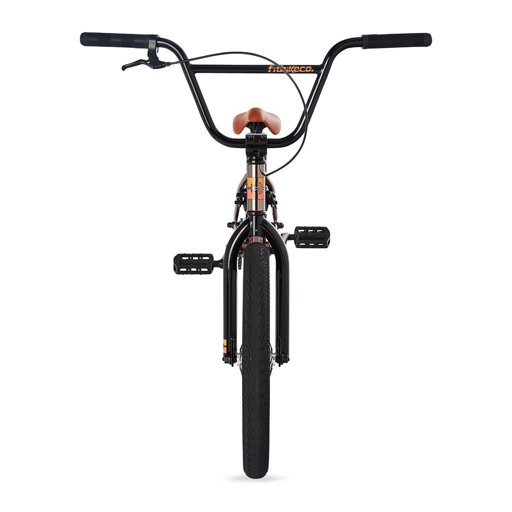 A front view of the Fit Series One 20 Inch Bike (2023), an entry-level black BMX with a brown seat, black handlebars, and black pedals, set against a white background.