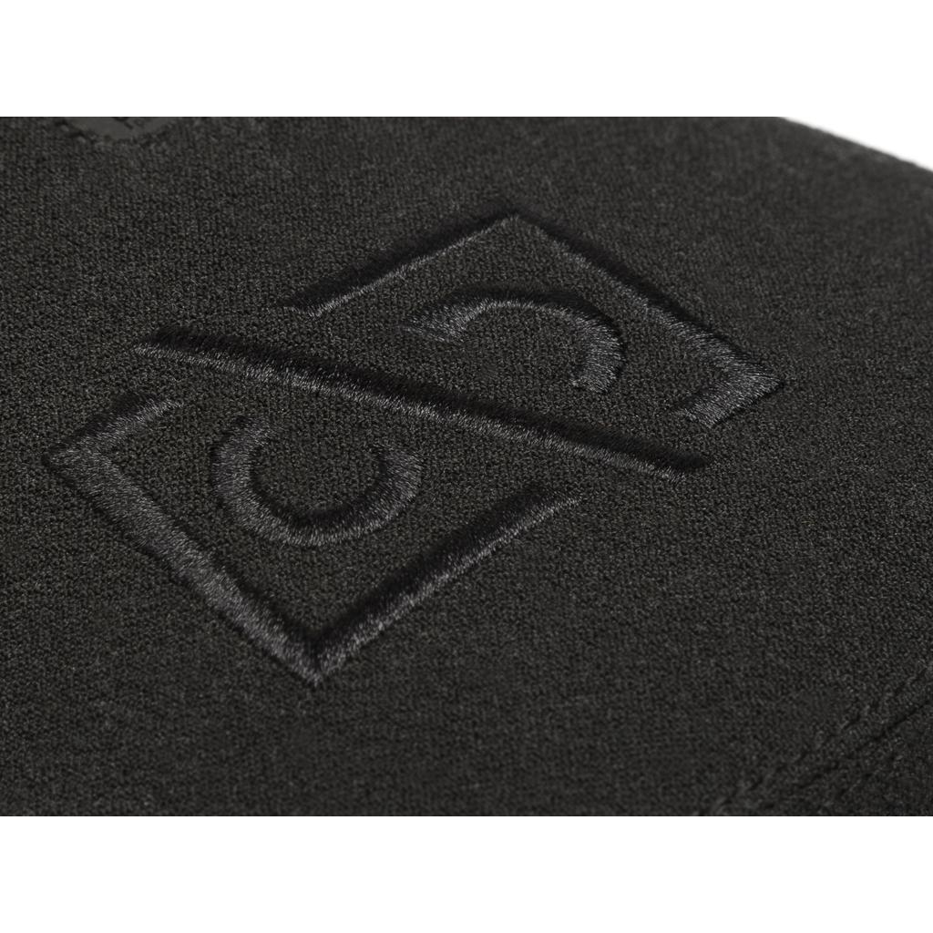 Close-up of black fabric with an embossed geometric logo of interlocking shapes, inspired by the Alex Donnachie signature BSD Alvx Eject Pivotal Seat.