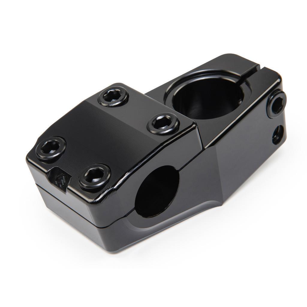 The Eclat Dune Stem is a BMX part made from 6061-T6 alloy, designed in black metal with four hex bolts on top and a circular clamp for securing handlebars.