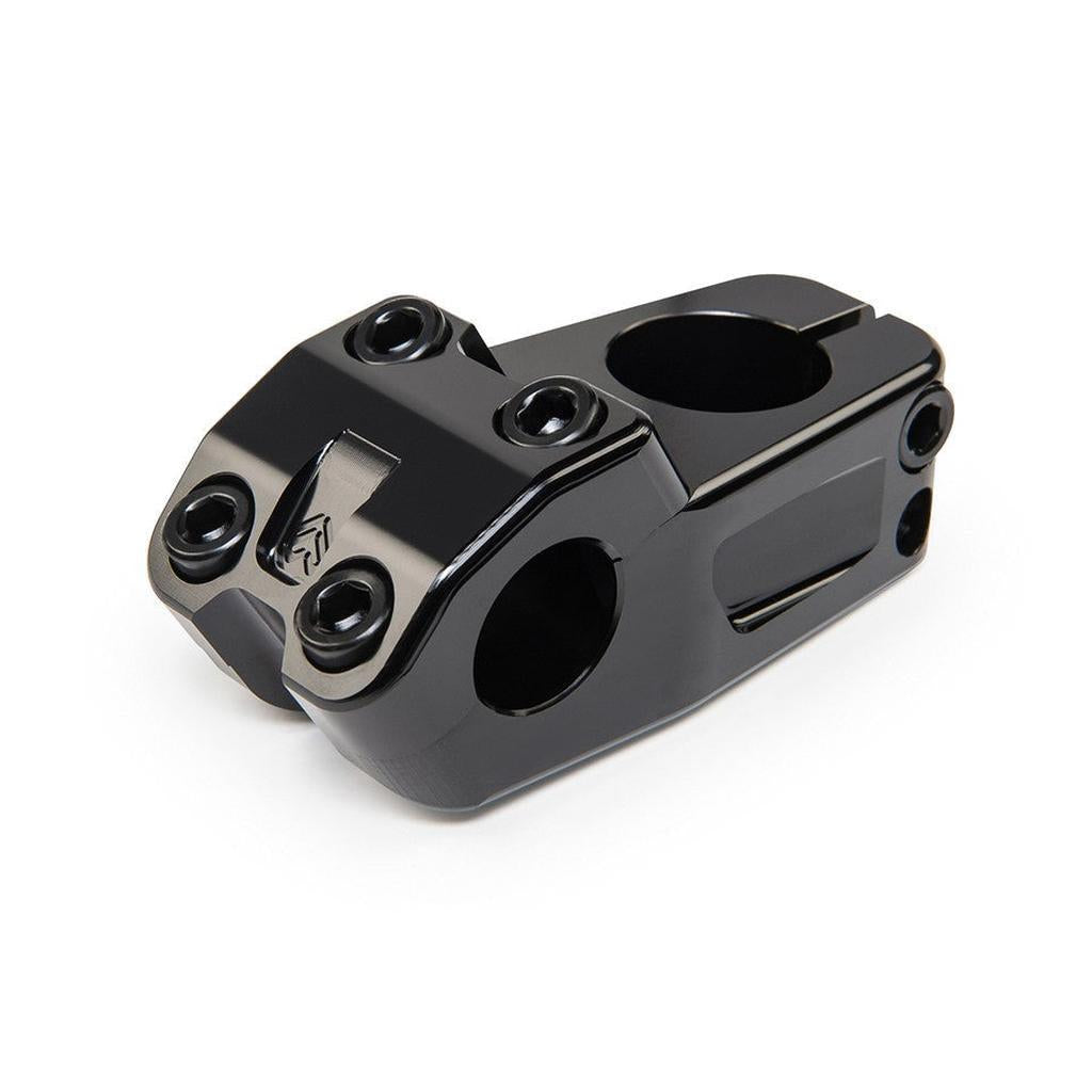 The Eclat Burns Stem is a durable, CNC-machined black BMX stem featuring a four-bolt front clamp and two side mounting holes, designed to securely connect your handlebars to the steerer tube.