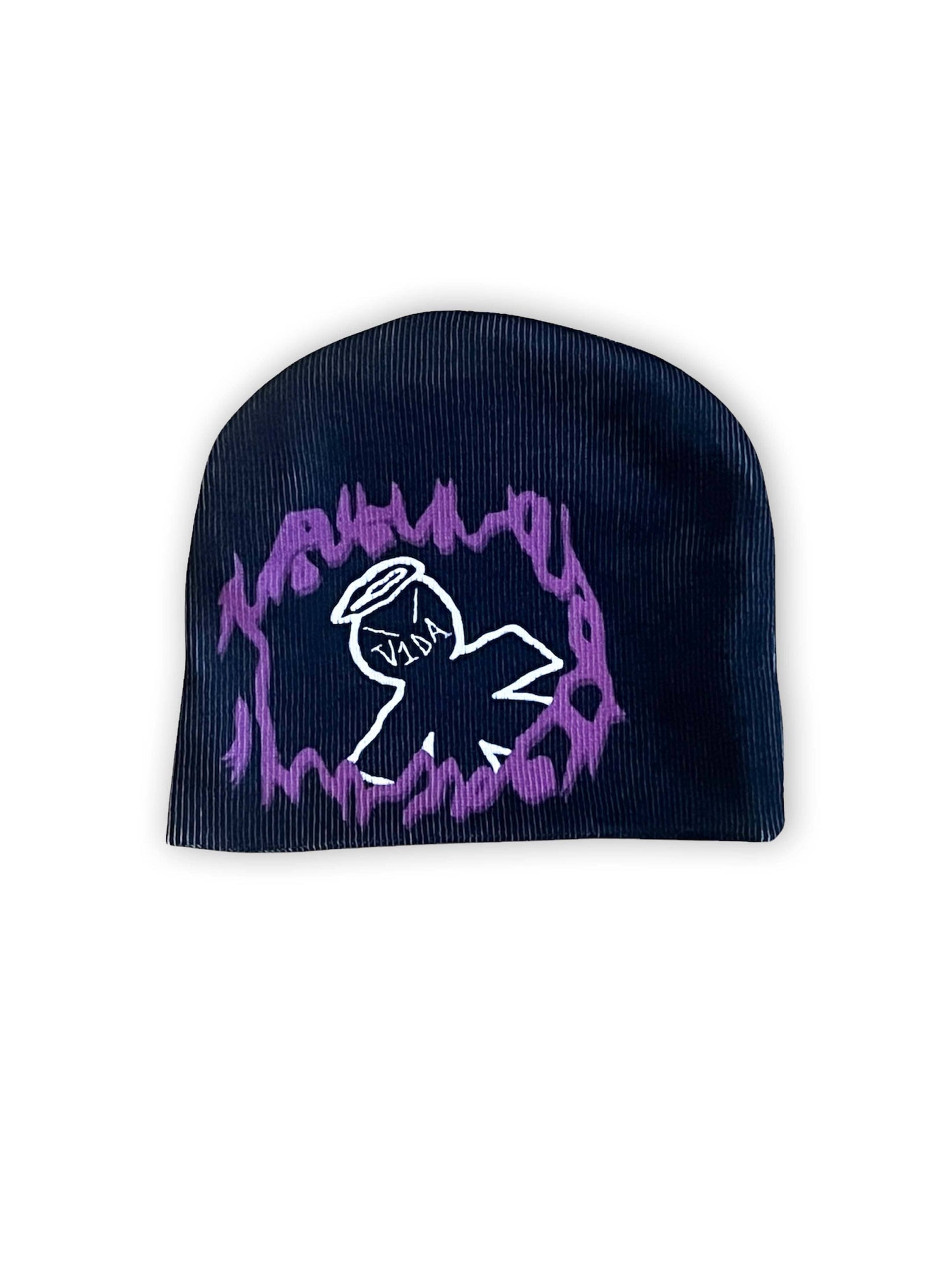 The V1DA Reversible Beanie is a black acrylic hat with a sublimated print: a white outlined figure with a halo, framed by a jagged purple border. Explore more at v1da.co.