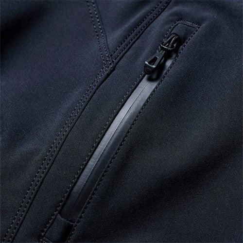 Close-up of TLD 26.1 Sprint Pro Pants / Mono Black, showcasing a waterproof zip pocket, visible stitching, and 4-way stretch fabric for durability and comfort.
