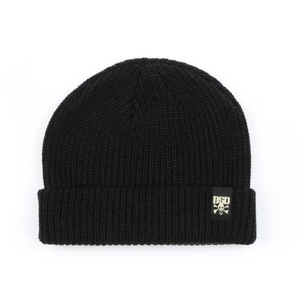 The BSD More Speed Beanie is a black acrylic knit hat with a folded brim and a small black patch featuring a white design and text, perfect for fans of the More Speed style.