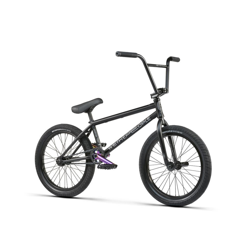 The Wethepeople Reason Shift 20 Inch Bike is a premium BMX featuring a full chromoly frame, straight handlebars, thick tires, and a compact design, displayed on a white background.