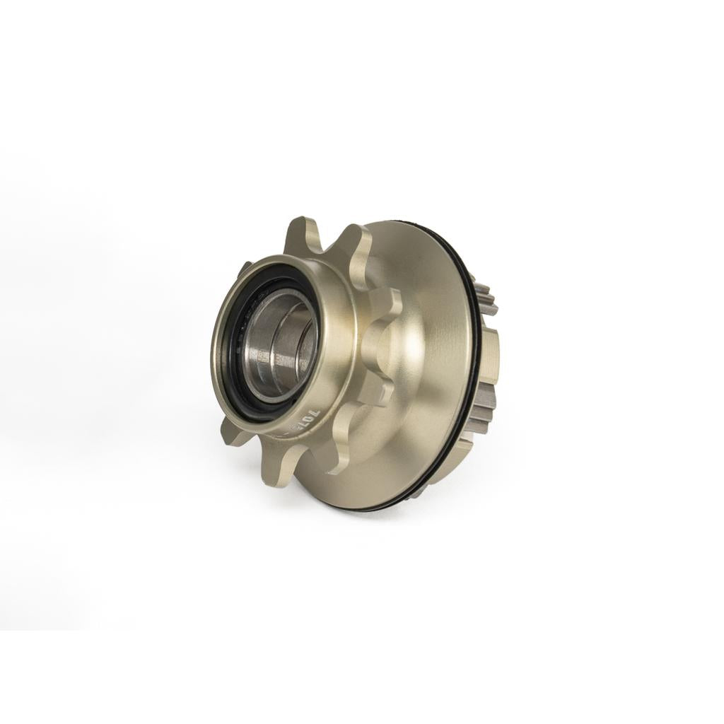 The Eclat Exile Hub Driver is a metal cassette hub driver with multiple splines, a cylindrical shape, and a visible sealed bearing at the center—ideal as a replacement for Exile hubs or use with 9T drivers, shown on white background.
