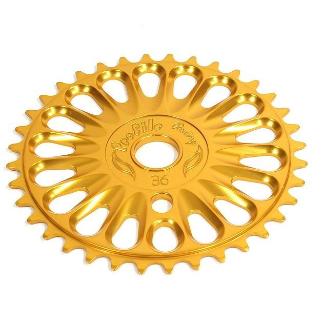 The Profile Imperial Sprocket is a gold-colored BMX sprocket with 25 teeth and circular cut-out holes, expertly crafted by Profile Racing.