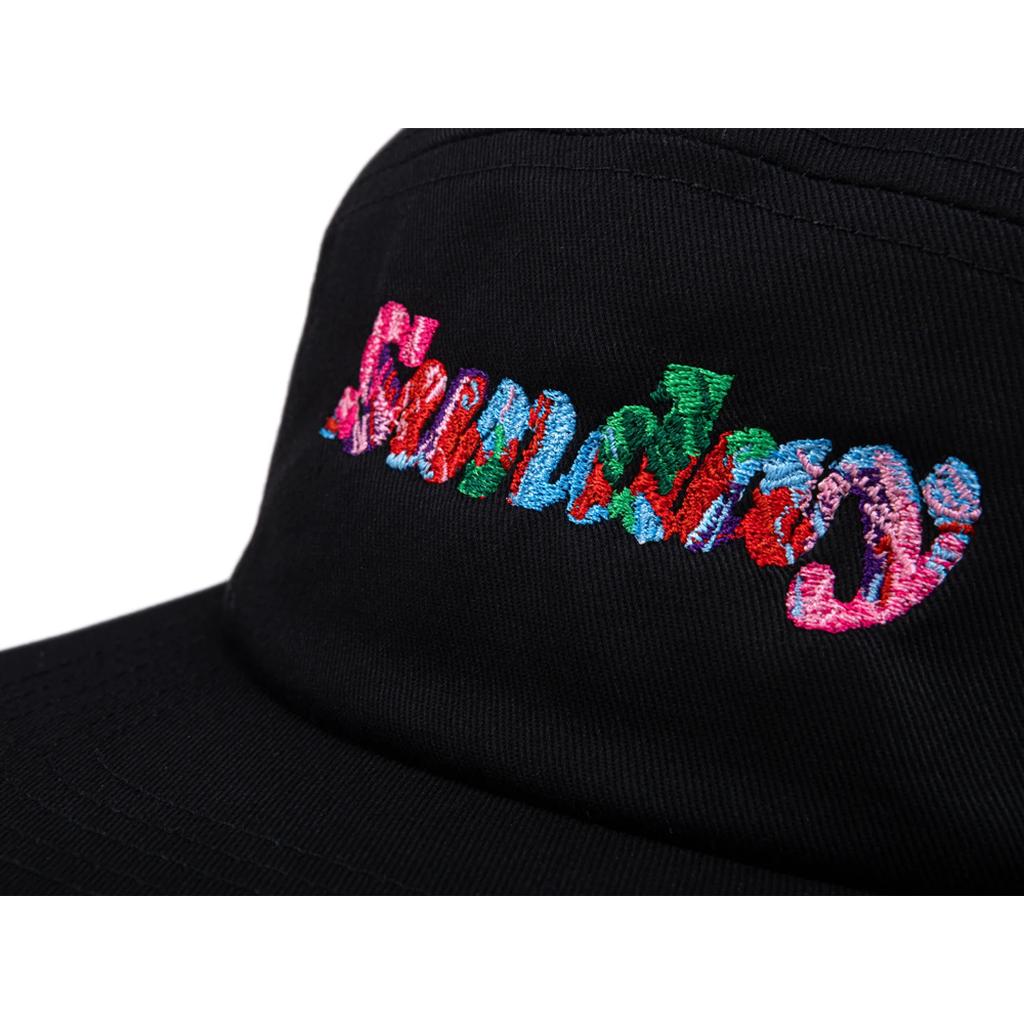Close-up of the Sunday Classy Scribble Cap, a black 5-panel cap with "Sunday" embroidered in colorful, patterned thread and a secure clip strap back—ideal for any back-to-school cap collection.