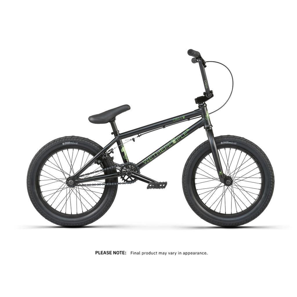 The Wethepeople CRS 18 Inch Bike in matte black with green accents features thick tires, raised handlebars, and a padded seat—an ideal BMX bike for stylish young riders, shown on a white background.
