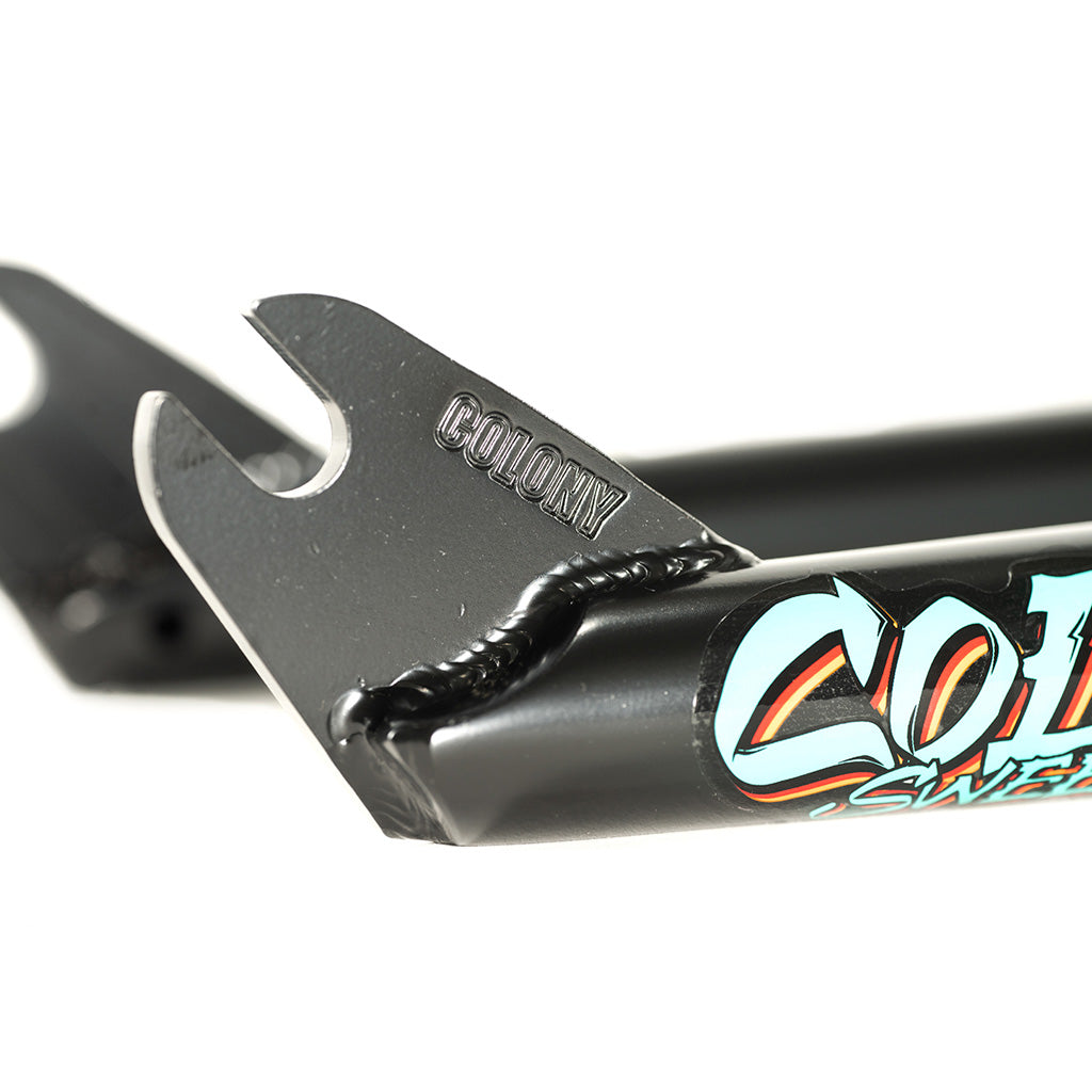 A black Colony 18 Sweet Tooth Fork with the word Columbia on it. The frame is lightweight.