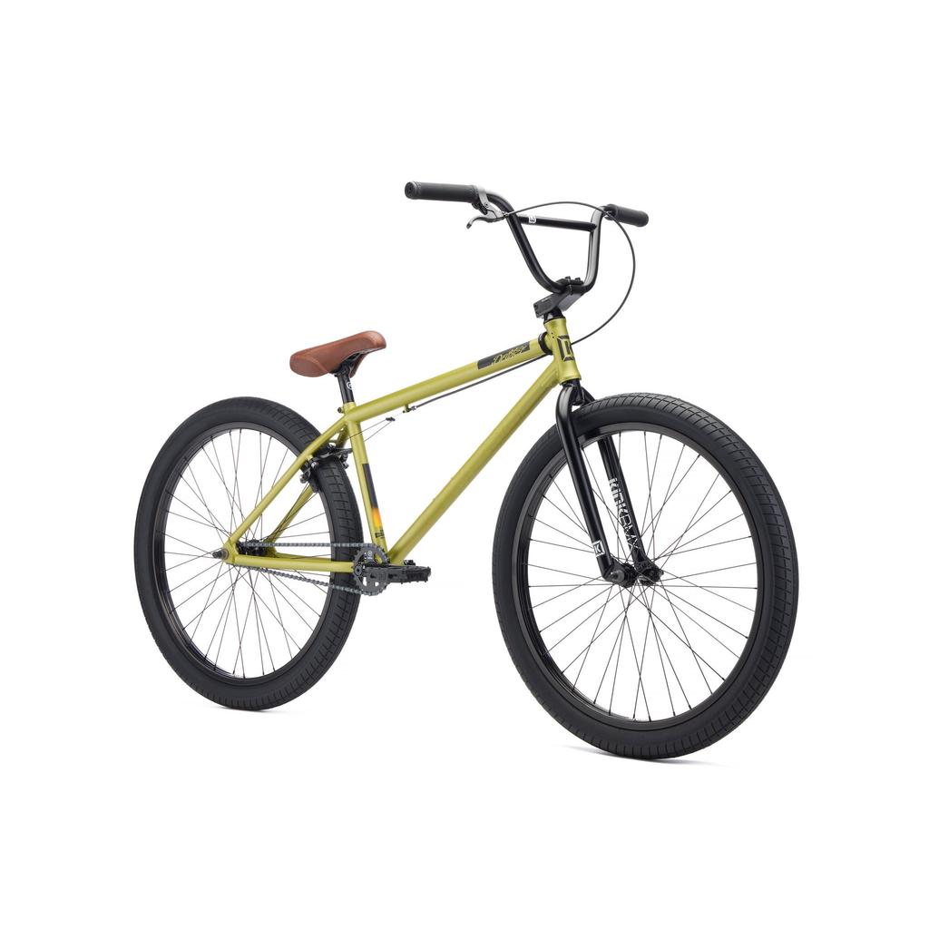 The Kink Drifter 26 inch Bike (2027) is a yellow BMX-style bicycle with black tires, black handlebars, a brown seat, and a durable chromoly frame, displayed on a white background.