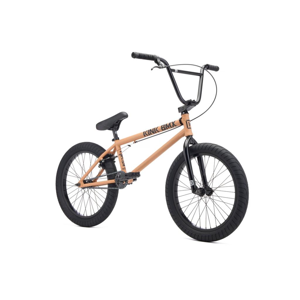 A tan and black Kink Steup XL 20 Inch Bike (2027) with a 21-inch top tube, thick tires, padded seat, and front and rear hand brakes is photographed on a white background.
