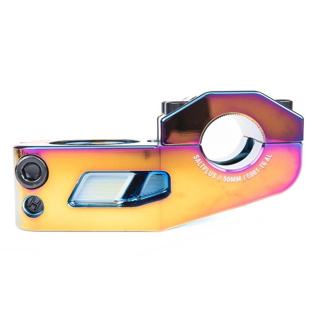 A close-up of the Salt Plus Manta Top Load Stem, made from CNC 6061-T6 Alloy with Shark Tooth Clamping, bolts, and machined details, shown on a white background.