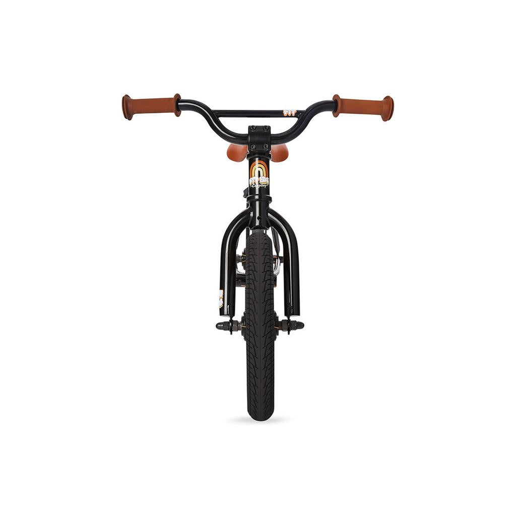 Front view of a Fit Misfit 12 Inch Balance Bike kids BMX with brown handlebar grips, thick front tire, and visible front brakes, set against a white background.