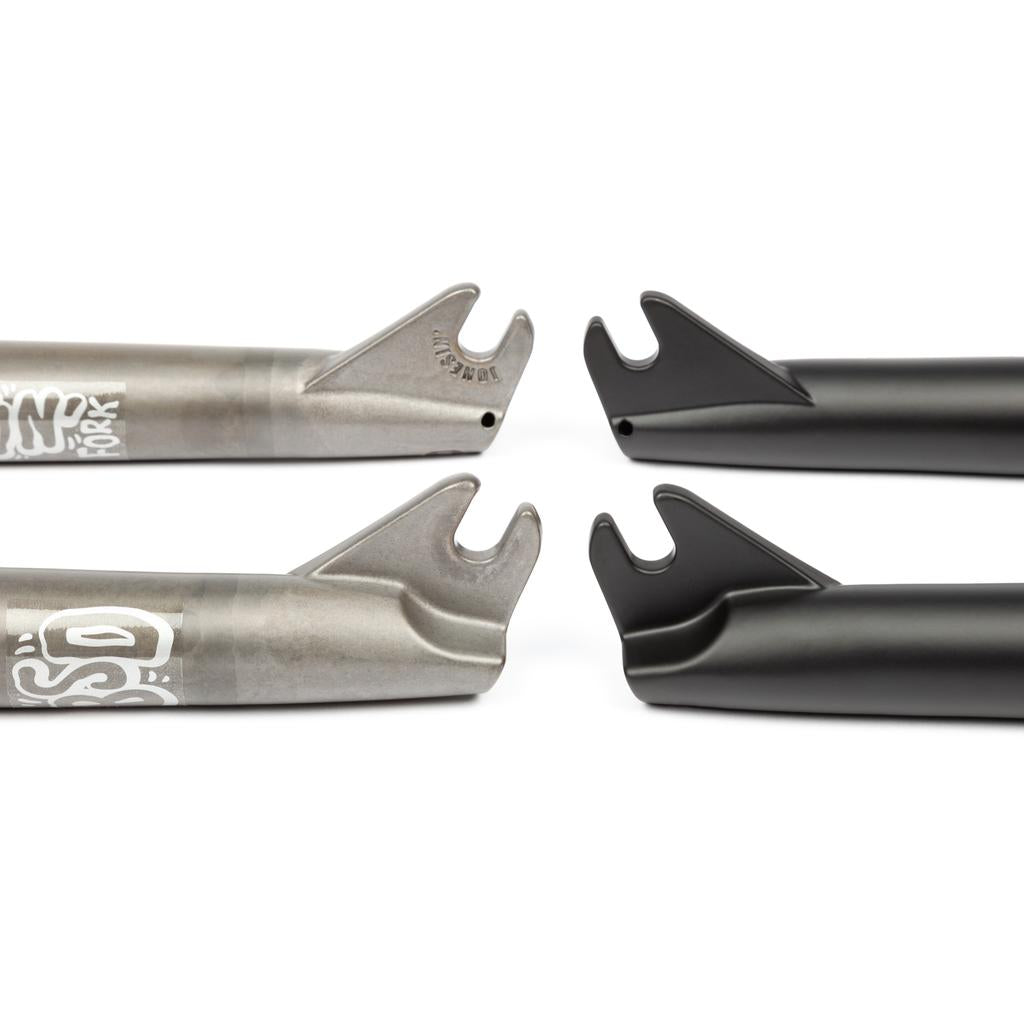 Four BSD Jonesin Fork dropouts—two raw with branding and two black, each with a 22mm offset—are arranged facing each other on a white background.